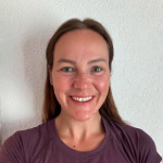 Julia is a swim coach who prioritizes challenging and fun workouts