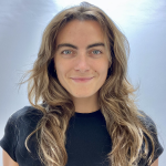 Olivia is a swim coach who creates a positive training atmosphere
